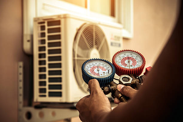 Professional Air Conditioning Service technician working in Springfield, VA